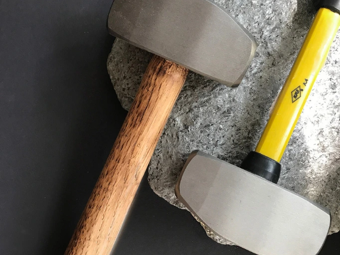 Two mallets on a surface