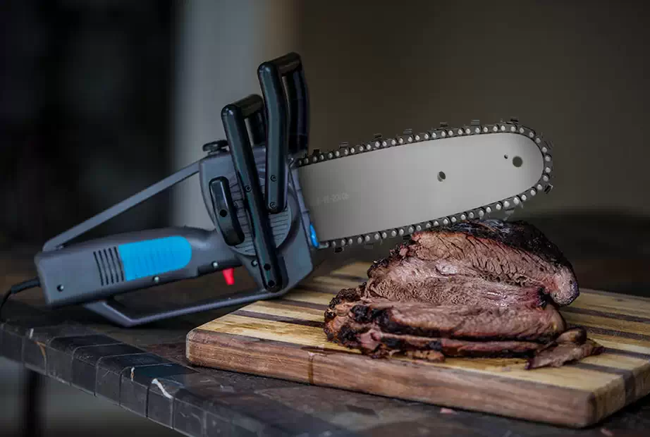 Using a chainsaw to cut meat