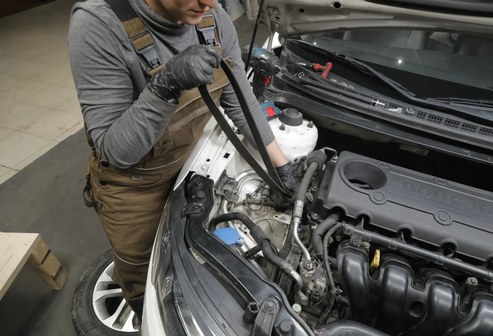 person working on a car