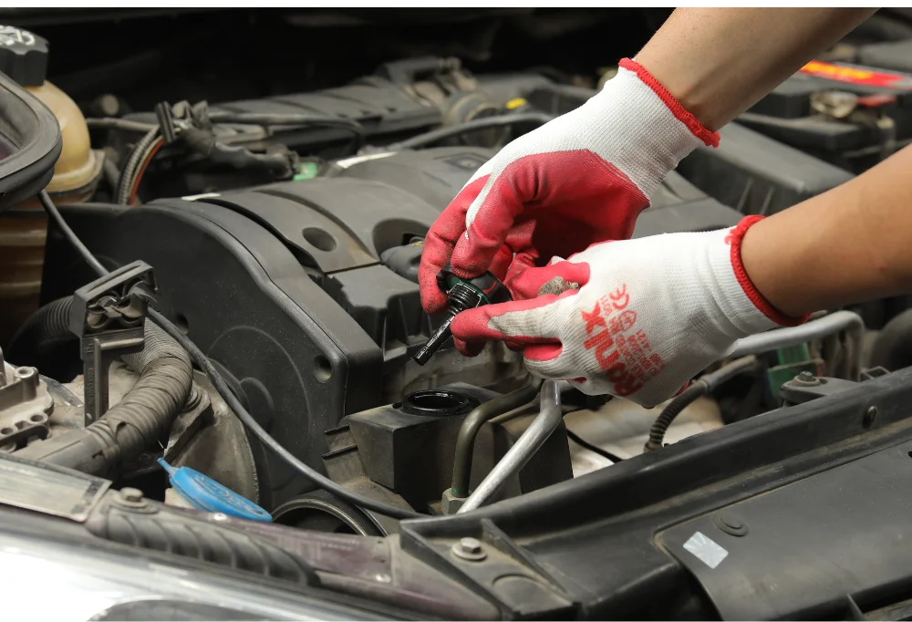 person changing oil